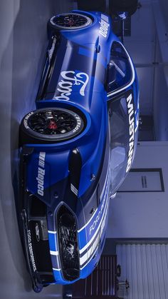 an overhead view of a blue race car