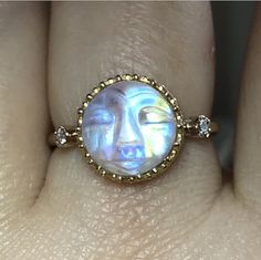 Please go to my Instagram to watch the video about this ring~ PRODUCT VIDEO ⇒ https://goo.gl/tkrFcq Like a little moon glowing In the sky. This stunning Man face rainbow moonstone dances with iridescence like you wouldn't believe. Such an elegant piece and with so much character. Perfect from day to night. Each piece of rainbow moonstone was hand carved, it's unique and charm. This listing is for one piece of rainbow moonstone ring only. Also available other stones, please see last photo. Gem: 1 Unique Yellow Gold Moonstone Ring, Yellow Gold Moonstone Jewelry, Unique Yellow Gold Moonstone Jewelry, Hand Forged Moonstone Jewelry In Yellow Gold, Unique 14k Gold Moonstone Ring Gift, Hand Forged Round Moonstone Ring, Yellow Gold Moonstone Jewelry With Halo, Yellow Gold Moonstone Jewelry With Halo Detail, Celestial Yellow Gold Moonstone Ring