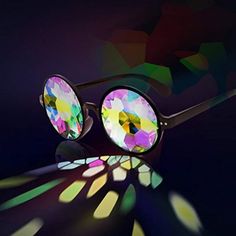 Black Frames Festival Sunglasses Mirrored Perfect Kaleidoscope Sunglasses For Festivals And Raves. Real Glass Crystal Lenses Provide The Most Perfect, Psychedelic Incredible Kaleidoscope Effect To The Wearer Top Design & Style: Rainbow Lenses, Black Frame, Kaleidoscope Glasses, Kaleidoscope Sunglasses, Rave Glasses, Kaleidoscope Lenses, Party Glasses, Rainbow, Real Glass Crystal, Crystal Lenses Includes A Microfiber Case That Also Acts As A Cleaning Cloth Elton John Sunglasses, Madewell Sunglasses, Kaleidoscope Glasses, Rave Glasses, Festival Sunglasses, Designer Eyeglass Frames, Circle Sunglasses, Rainbow Prism, Rose Gold Sunglasses