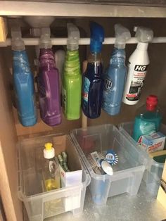 there are many bottles and containers on the shelf