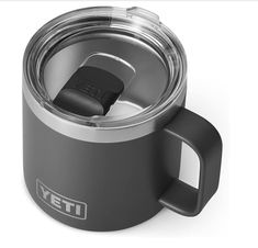 the yeti coffee mug is shown with its lid open