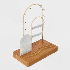 a wooden stand with a white object on it