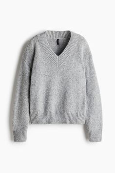 Loose-fit sweater in a soft knit. V-neck  dropped shoulders  and long sleeves. Ribbing at neck  cuffs  and hem. Women’s Sweater, Christmas List Inspo, Womens Cream Sweater, Green Sweater Women, V Neck Knit Sweater, Womens Grey Sweater, Soft Sweaters, Xmas Wishlist, Wool Sweaters Womens