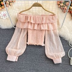 Cute tulle long sleeve topsFabric: blendedColor: pink, apricot, whiteSize(cm): free size (1inch=2.54cm)length 36cm bust 62-90cm sleeve lenegh 50cmPlease check the size carefully when you choose items.For more pictures of the dress, please contact us, thank you. Pink Fitted Chiffon Top, Fitted Pink Chiffon Top, Feminine Long Sleeve Party Tops, Trendy Long Sleeve Chiffon Top, Cute Long Sleeve Beige Blouse, Cute Beige Long Sleeve Blouse, Sheer Lantern Sleeve Tops For Spring, Pink Long Sleeve Chiffon Top, Pink Ruffled Lantern Sleeve Tops