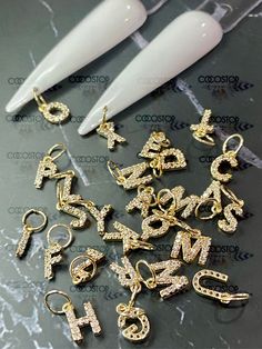 26pcs A-Z diamonds Zircon Nail Letters dangling Nail Charms 3D 💎 26pcs/pack (entire Alphabet) 💎 Material: metal alloy 💎 Colors : Gold 💎 It comes with pierces as shown 💖Please check out another dangling letters here: https://www.etsy.com/CocoStop/listing/1208461123/26pcs-a-z-rhinestone-nail-letters? 💖High quality and Easy Used: Garment, Nail Art, Shoes, Cell Phone, Box, Pen, greeting cards....etc 💖Many styles of rhinestone charms nail art accessories are available in shop .Please check out Letter Charms On Nails, Nail Dangle Charms, Nails With Dangle Charms, Cosmetology Kit, Nail Polish Gift Set, Art Shoes, February Nails, Phone Box, Nail Jewelry