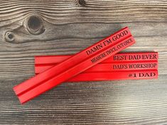 three red pencils with the words damn i'm good and best dad ever on them