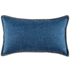 the blue denim pillow with fringe trims is shown in front of a white background