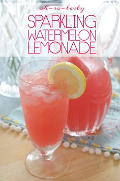 two glasses filled with watermelon lemonade sitting on a table