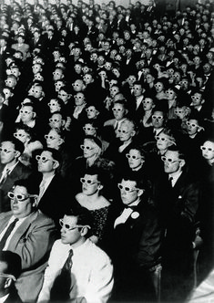 a large group of people wearing masks and sitting in front of each other at an event