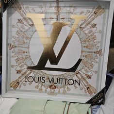 the louis vuitton logo is on display