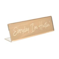 a metal sign that says everyday i'm hashiive in white writing on it