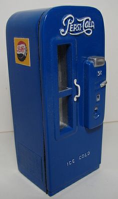 an old fashioned pepsi cola machine with ice cold