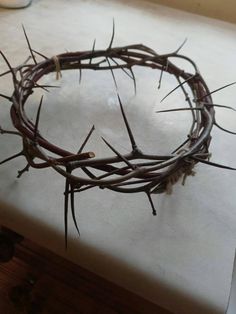 a crown of thorns on top of a table