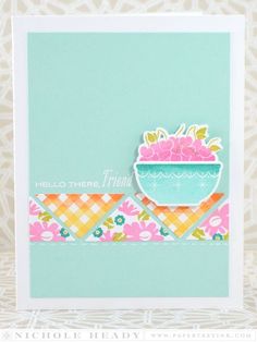 a handmade card with a bowl of flowers on it