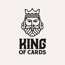 the king of cards logo is shown in black and white, with a crown on top