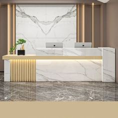 an office with marble walls and gold trim on the front desk, along with two laptops