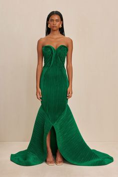 A sculpturally designed plissé strapless gown featuring a exaggerated train and artful bust. — Sculpted plissé fabric — Rose bud shaped bust details — Exaggerated train — Mermaid tail hem Green Gown, Fashion Couture, Rose Bud, Sequin Gown, Strapless Gown, Cult Gaia, Mermaid Tail, Fabulous Fashion, Spring 2024