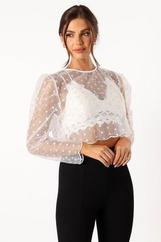 DETAILS
The lace shirt design adds a touch of femininity, while the high round neckline elongates your neck and accentuates. The functional button closure allows you to feel comfortable all night long, giving you the perfect fit every time.


lace shirt style
high round neckline
long sleeve

scalloped hemlines
button close
unlined


material - 100% polyester









SIZING

model is 5' 7" and wears a Size S
model stats: bust - 33", waist - 27", hips - 36"















GARMENT CARE

cold hand Fitted Lace Mesh Top With Lace Trim, Elegant Fitted Sheer Top, Chic Scalloped Lace Top For Fall, Feminine Fitted Mesh Top For Night Out, Fitted Chic Lace Top, Fitted Lace Top In Chic Style, Evening Tops With Lace Sleeves And Stretch, Summer Evening Tops With Lace Sleeves, Summer Evening Top With Lace Sleeves