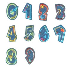 the numbers are made out of felt and have different designs on them, including one for each number