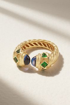 David Yurman’s ‘Renaissance’ collection fuses sculptural forms with vibrant colors and shapes reminiscent of paintings from the era. This ring is made from 18-karat gold that's etched with the signature 'Cable' design. Each end is tipped with an arrangement of gleaming tsavorite and tanzanite in geometric settings. Tsavorite Ring, Sculptural Ring, Emerald Ring Gold, Designer Pieces, David Yurman Jewelry, Tanzanite Ring, Gold Diamond Rings, David Yurman, White Ring