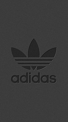 the adidas logo is shown in black and white on a dark background, as well as