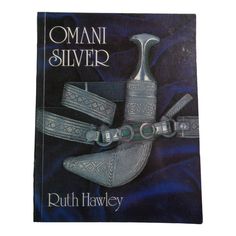 a book with an image of a silver object on it's cover, and the title