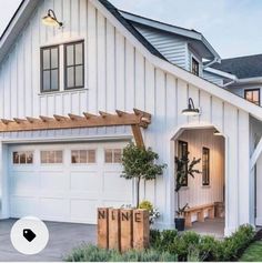 a white house with an attached garage