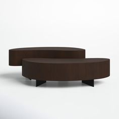 two circular tables sitting next to each other