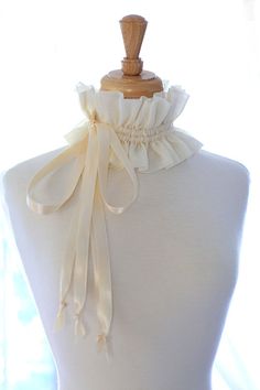 Dress-up a whimsical ensemble with a convertible Victorian fashion collar, featuring a beautiful handwoven cotton fabric and ivory satin ties. Enchanting on a summer evening over bare shoulders or perfectly lovely with a jacket or sweater during the colder months. Double satin drawstring ties make it easy for you to create your own look with it on a whim.  Wear it 4 different ways: •Gather up as a choker with ties in front or to one side. •Gather up as a choker with ties hanging down the bac... Monster Cookie Bars, Bare Shoulders, Pink Collars, Virtual Closet, Summer Evening, Monster Cookies, Santa Monica, Victorian Fashion, Diy Clothes