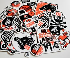 an assortment of orange and black stickers