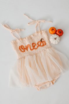 Beautiful one romper for your little pumpkin babe. This listing is for a peach color romper, one lettering in coral and a pumpkin appliqué next to it.  Birthday photoshoots, special events, etc. If you'd like a different color or saying, don't hesitate to contact us One Year Old November Birthday Party, Pumpkin Themed 1st Birthday Party, Onederfall Birthday, Pumpkin One Year Old Pictures, First Birthday Party Themes Fall, October First Birthday Photoshoot