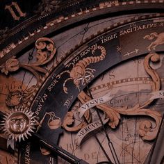 an ornate clock with roman numerals on it