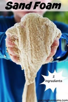 a person holding a sand foam in their hand with text overlay that reads, how to make homemade sand foam