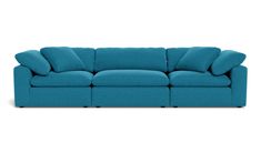 a blue couch sitting on top of a white floor