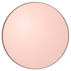 a round object that is pink and has brown lines on the bottom, it appears to be an empty circle