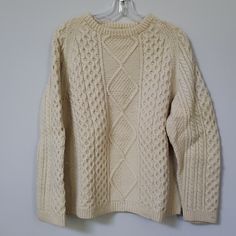 Multi Patterned Cable Knit 100% Wool All Wool Ribbed Collar Cuffs And Hem Irish Cream Fisherman Sweater 23.5" Chest 30" Sleeve 25.75" Shoulder To Hem Questions? Leave A Comment Below! Coastal Granddaughter Sweater, Cable Knit Sweater, White Cable Knit Sweater, Fisherman Sweater, Multi Pattern, Cable Sweater, Light Academia, Collar And Cuff, Cable Knit