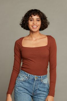 **All sale items are final sale** Made in Los Angeles Product Details: Long sleeve Deep neckline Stretch rib fabric Can be dressed up or down Sizing: Fits true to size. Model wears small. Model measurements: Height: 5'9” Waist 25.5” Bust 32” Hip 36” Size guide: 0-2 extra small 4 small 6-8 medium 10 large 12-14 extra large 14-16 XXL Content: 65% Polyester 26% Rayon 9% Spandex Care Instructions: Machine wash on gentle cycle. Lay flat to dry. Rib Top, Rib Fabric, Deep Neckline, Ribbed Fabric, Ritual, Extra Large, Rust, Dress Up, Angeles