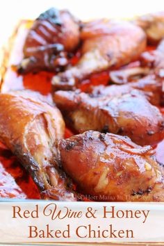 red wine and honey baked chicken on a white plate with text overlay that reads, red wine and honey baked chicken