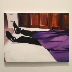 a painting of a person laying on a bed