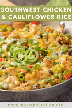 a skillet filled with mexican food on top of a wooden table