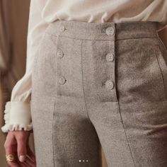 Button In Natural Horns // Double Button Placket // Straight-Leg Trousers // Inlaid Pockets On The Sides With Single Piping // 50% Wool 48% Cotton, 2% Elastane // Made In Bulgaria // Inseam 29 Inch // Bottom Leg Width: 9.5 Inch, Lay Flat // Waist 13 Inch Lay Flat // Hip 16 Inch, Lay Flat // Rise: 11.5 Inch Please Note: While The Item Is New With Tag And Never Worn, The Hem Was Professionally Hastened To Create Belt Loops Around The Waist (Alteration Price For Belt Loops Is Not Included In This I Classy Womens Pants, Luxury Straight Leg Women's Culottes, Luxury Tapered Dress Pants For Spring, Luxury Classic Cropped Leg Pants, Luxury Flax Pants For Workwear, Luxury Standard Cut Leg Bottoms For Women, Cheap Fitted High-waisted Dress Pants, Luxury Straight Fit Tapered Leg Bottoms, Luxury Cropped Leg Bottoms For Fall