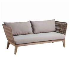 a wooden couch with two pillows on it's back and one arm resting against the cushion