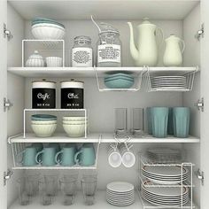 the shelves are filled with dishes and cups