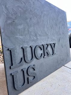 a sign that says lucky us on it