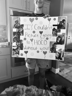 a young boy holding up a sign that says i couldn picture going to hoo without you