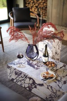 the table is set with wine and food