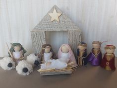 a nativity scene with figurines and decorations