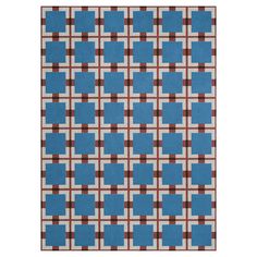 a blue and brown rug with squares on it