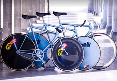 three bicycles are parked next to each other