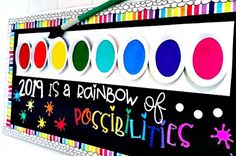 a sign that has been decorated with different colored paint colors and the words, 2013 is a rainbow of posciulicities